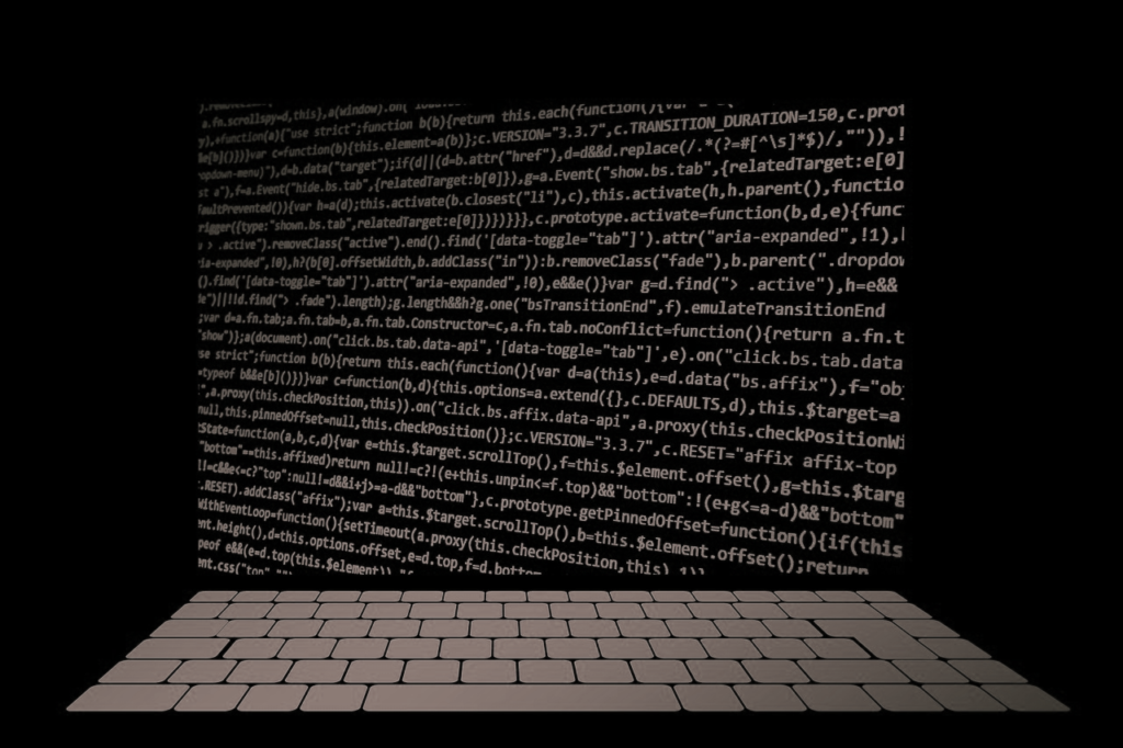 Wall of code with light keyboard